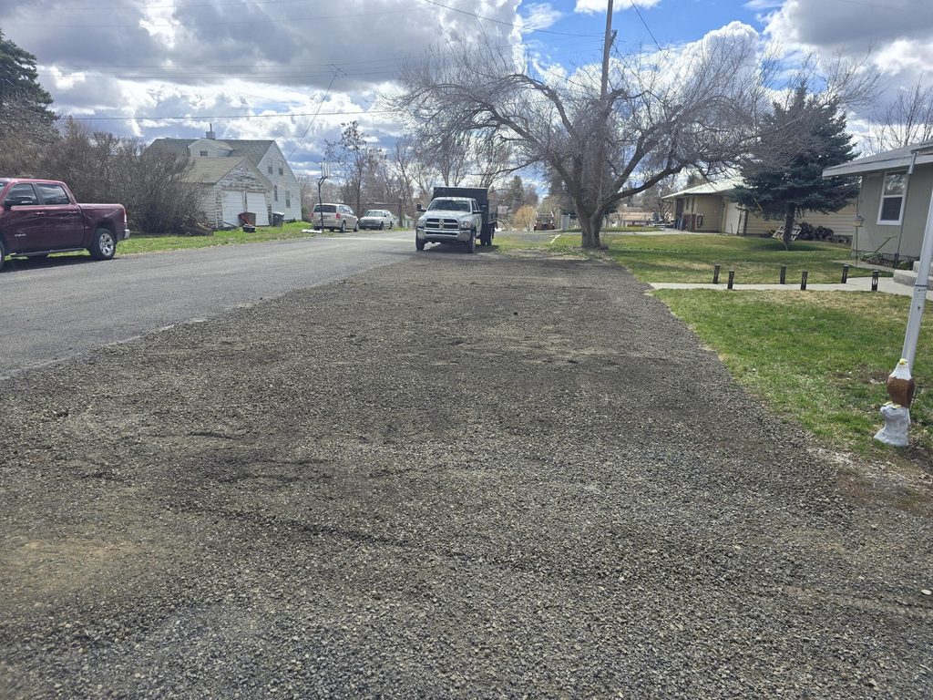 Freshly graded gravel road in a Davenport neighborhood